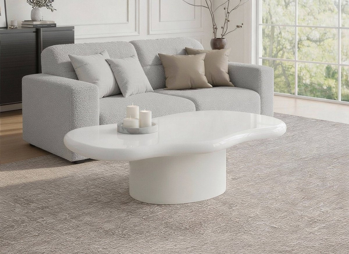 Table basse ovale en béton brossé blanc plateau asymétrique ZELINE