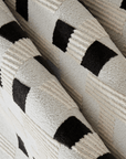 Tapis blanc à motifs noirs, verts et orange 200 x 290 cm ELINN